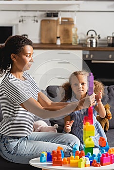 African american nanny in striped t