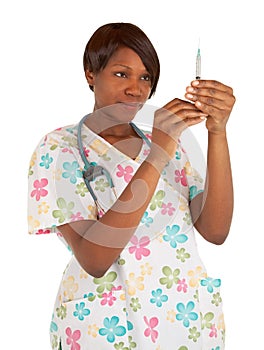 African American Nurse Checking Dosage photo