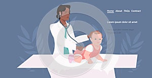 African american pediatrician doctor examines baby checking heart beat with stethoscope medical consultation medicine