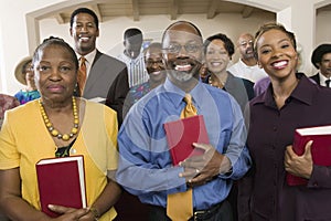 African American People With Bibles In Church