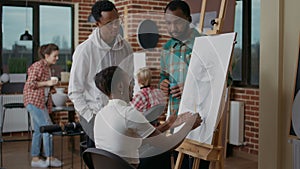 African american people drawing vase sketch in art class