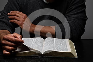 African American Person Studying the Bible photo