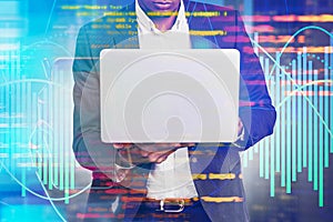 African American programmer writing code