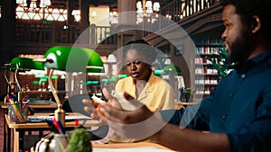 African american scholars reading course notes and comparing information