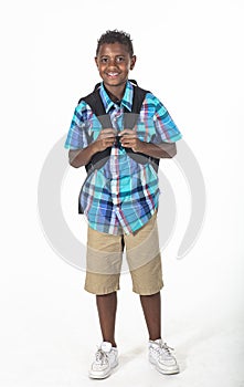 African American school boy with backpack isolated on white