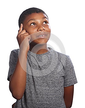 African American school boy looking up thinking