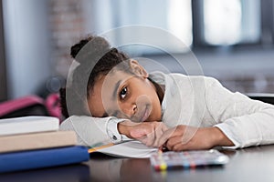 African american schoolgirl doing homework