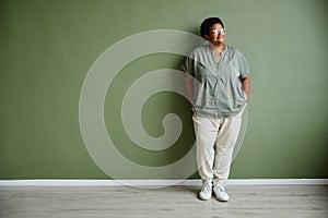 African American Senior Woman on Green Wall