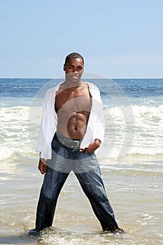 African American Man Posing in the Ocean Wate