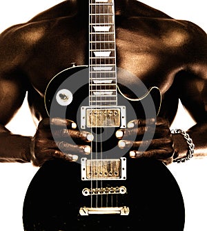 African american shirtless man holding electric guitar