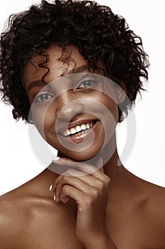 African American skincare models with perfect skin and curly hair. Beauty spa treatment concept.