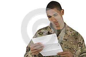 African American Soldier reads a letter