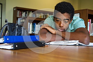 African American Student having problems with school work.