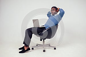 African american stylish business man at the workspace office on white background in studio shot