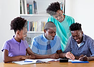 African american teacher learning with students