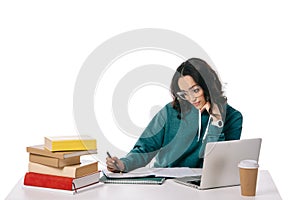 african american teen student studying at table