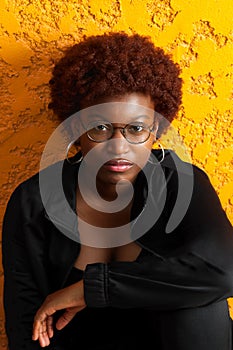 African American Teenage Girl with Red Afro and an Intense Stare