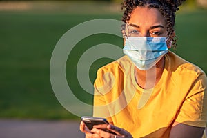 African American Teenager Girl Woman Wearing Coronavirus COVID-19 Face Mask