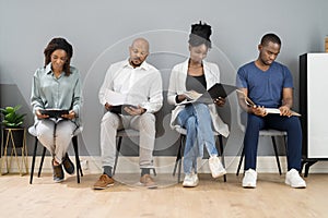 African American Unemployed Job Applicants Waiting photo