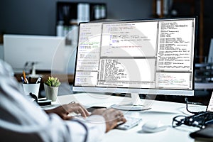 African American Web Coder At Computer. Software Programmer