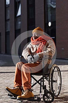 African American Wheelchair User in City
