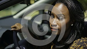 African American Woman alone looking out of window