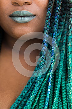 African American Woman with Beautiful Teal Green Blue Braids