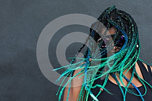 African American Woman with Beautiful Teal Green Blue Braids