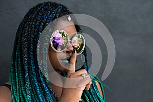 African American Woman with Beautiful Teal Green Blue Braids