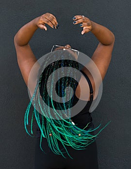 African American Woman with Beautiful Teal Green Blue Braids