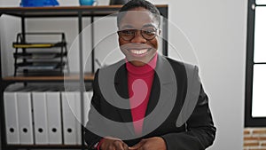 African american woman business worker using computer drinking coffee at office