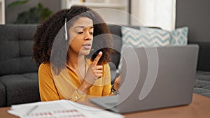 African american woman call center agent having video call working at home