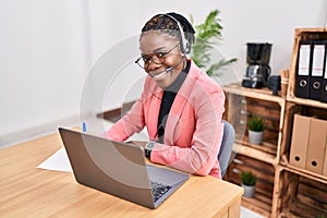 African american woman call center agent working at office