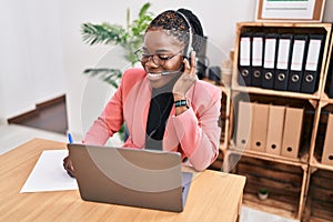 African american woman call center agent working at office