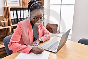 African american woman call center agent working at office