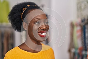 African american woman customer smiling confident standing at clothing store