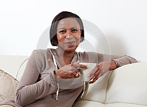 African-American woman drinking tea.