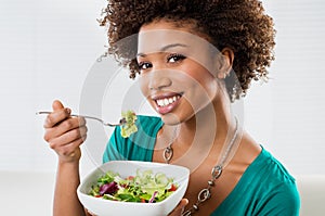 African American Woman Eating Salad