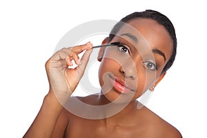 African American woman eyelash separator brush photo