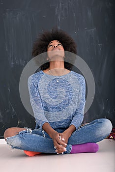 African American woman on a gray background