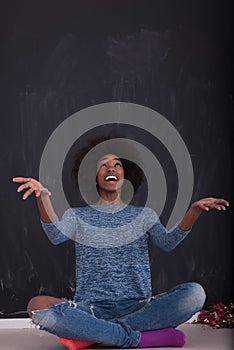 African American woman on a gray background