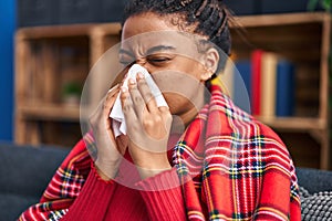 African american woman illness using napkin at home