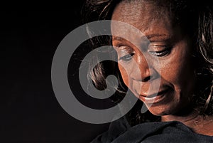 African American Woman Looking Down