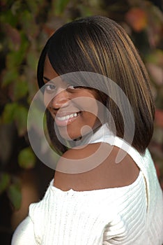 African-American woman looking an smiling