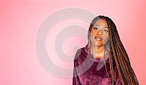 African American woman on pink background