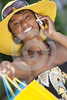 African American Woman, Shopping Bags & Cell Phone