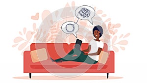 African american woman sitting on sofa with laptop on online psychological consultation. Concept of online psychotherapy
