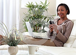 African-American woman with smartphone.