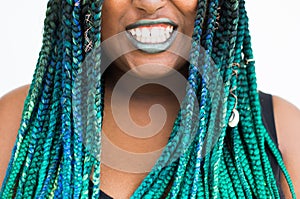 African American Woman Sneering with Beautiful Teal Green Blue Braids