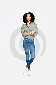 An African-American woman sports a professional look in a crisp olive shirt and blue jeans